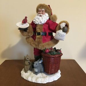 Santa and Wildlife Figure Statue
